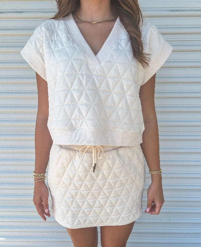 ALL I NEEDED CREAM QUILTED MINI SKIRT