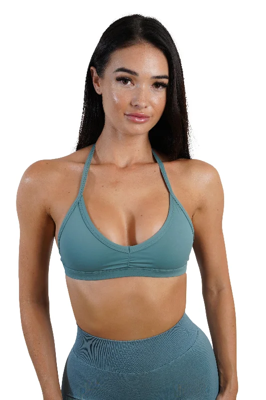 Criss-cross strap sports bra – Sports bra with straps that cross over at the back, providing extra support and a stylish look.Criss-cross strap sports bra – Sports bra with straps that cross over at the back, providing extra support and a stylish look.DEFINE BRA - OLIVE GREEN